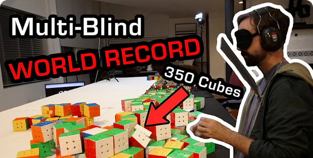 Graham Siggins solves 319 cubes blindfolded