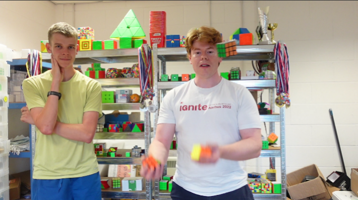 conversation with ‪@CubeJuggling‬ about his goal to juggle and solve cubes